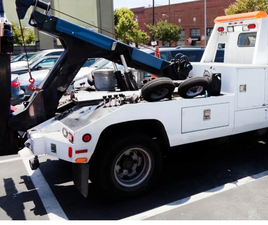 tow truck on highway approach to Byron