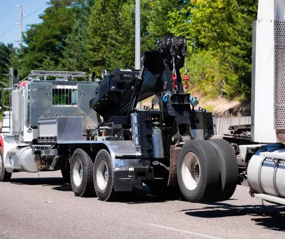 heavy-duty wrecker on a St. Thomas highway shoulder