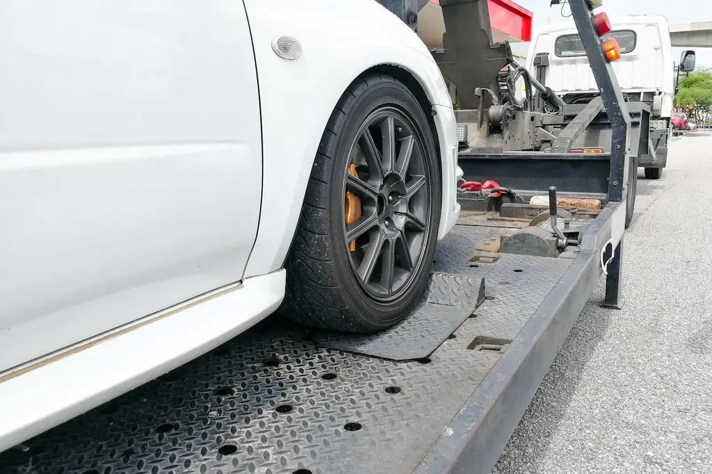 Towing Car Loaded On Tow Truck
